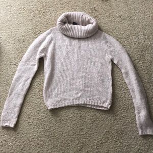 Comfortable pink turtleneck sweater
